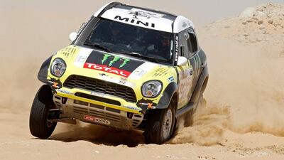 Nani Roma and his Mini leads the car division of the Abu Dhabi Desert Challenge after Stage 1 on April 6 2014. Courtesy Abu Dhabi Desert Challenge