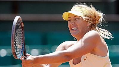 Maria Sharapova started her French Open bid by dropping just three games against Mirjana Lucic.