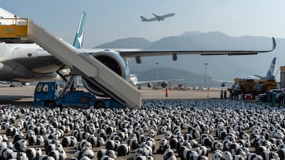 Part of the 2500 panda sculptures are displayed at the Hong Kong International Airport during the welcome ceremony of the panda-themed exhibition "Panda Go!" in Hong Kong, Monday, Dec. 2, 2024. (AP Photo / Chan Long Hei)