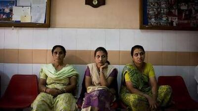 Pregant women and their relatives wait to see Dr. Nayana Patel in her clinic in Anand, Gujarat, India.