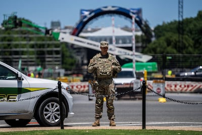 A member of the US National Guard patrols in front of the UFC Freedom 250 stage during assembly on the South Lawn of the White House in Washington on June 3, 2026. Reuters