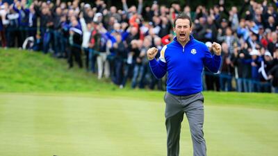 Graeme McDowell of Europe celebrates victory against Jordan Spieth of the United States on the 17th hole during the singles matches of the 2014 Ryder Cup on Sunday at Gleneagles. McDowell won his match 2&1. Harry How / Getty Images
