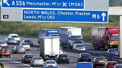 Vehicles pass along the M6 motorway outside Manchester, England. PA Archives