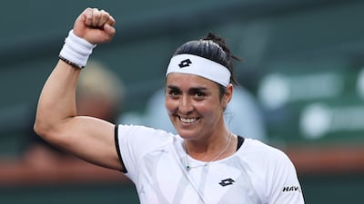 INDIAN WELLS, CALIFORNIA - OCTOBER 14: Ons Jabeur of Tunisia celebrates to the crowd after her straight sets victory against Anett Kontaveit of Estonia during their quarterfinal match on Day 11 of the BNP Paribas Open at the Indian Wells Tennis Garden on October 14, 2021 in Indian Wells, California. Clive Brunskill / Getty Images / AFP
