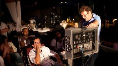 Ali Mostafa on the set of Classified. Courtesy MBC