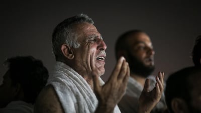 Muslim pilgrims pray on the Mountain of Mercy, on the Plain of Arafat, near the holy city of Mecca, Saudi Arabia. Mosa'ab Elshamy / AP Photo