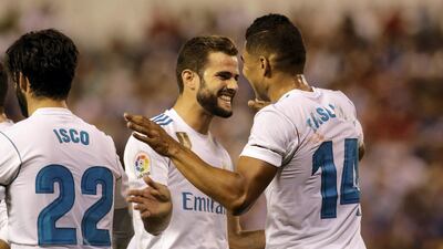 Nacho, centre, and his Real Madrid teammates are hoping to be more celebrating in December at the Fifa Club World Cup in the UAE. Miguel Vidal / Reuters