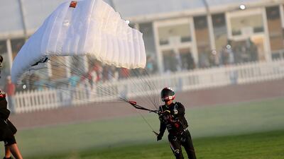 Skydiver Ernesto Gainza completes a World Record jump, at Skydive Dubai, using the world's smallest parachute. Satish Kumar / The National