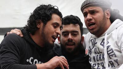 Abdelbaset Sarout, left, sings at a rally to commemorate the start of the Syrian revolution, in Maaret Al Numan in Idlib province on March 15, 2019. AFP