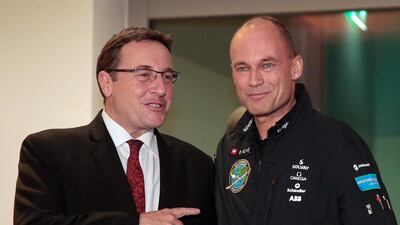 Bertrand Piccard, right, founder of the long-range experimental solar-powered aircraft project Solar Impulse, with Achin Steiner of the United Nations Environment Programme. Jacques Demarthon / AFP