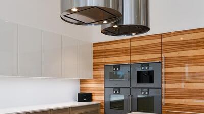 The kitchen was designed by the luxury German brand, Poggenpohl, using the latest Gaggenau appliances. Courtesy Ocean View Real Estate