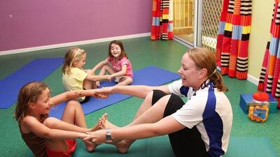 Alison Sykes teaches children relaxation methods as part of the Calm For Kids programme in Brisbane, Australia.