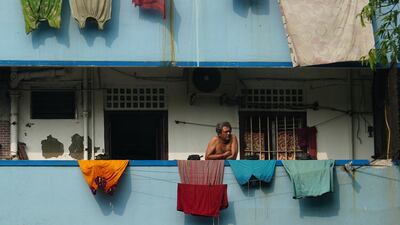 A resident watches as US Secretary of State Marco Rubio's motorcade heads towards the Mother Teresa House of the Missionaries of Charity, in Kolkata, India. Reuters