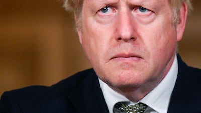 Britain's Prime Minister Boris Johnson looks on during a coronavirus briefing in Downing Street, London, Monday, October 12, 2020. AP