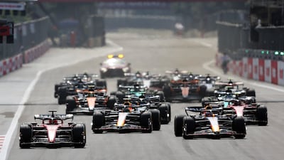 Ferrari's Charles Leclerc leads the pack at the start of the race. EPA