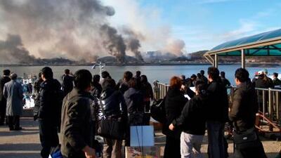 Plumes of smoke rise from Yeonpyeong island in the disputed waters of the Yellow Sea after North Korea fired dozens of artillery shells onto the island.