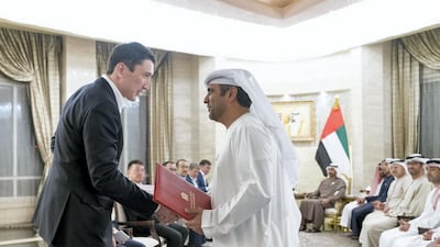 Sheikh Mohamed bin Zayed, Crown Prince of Abu Dhabi and Deputy Supreme Commander of the UAE Armed Forces (not shown) and Nursultan Nazarbayev, President of Kazakhstan (not shown), witness an MOU signing ceremony at Al Shati Palace. Seen signing on behalf of the UAE is Prime Project Development Consultancy (R) with Ministry of Energy of Kazakhstan (L). Rashed Al Mansoori / Ministry of Presidential Affairs