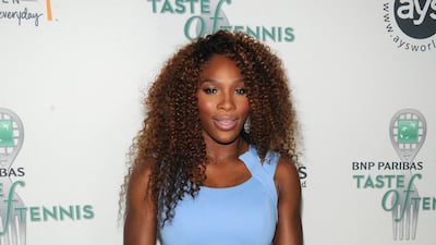Serena Williams, in a blue dress, attends the 14th Annual BNP Paribas Taste Of Tennis at W New York Hotel on August 22, 2013 in New York City. AFP