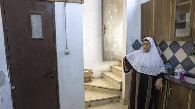 Fahima Shamasneh in the kitchen of her tiny two room basement home in the East Jerusalem neighbourhood of Sheik JarrahHeidi. Levine for The National