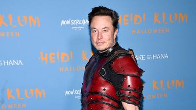 The world's richest man came dressed as a devilish character. Invision / AP