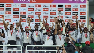 Fiji players celebrate their win over Spain. Victor Besa / The National