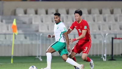 Salem Al Dawsari of Saudi Arabia wins the ball. Pawan Singh / The National