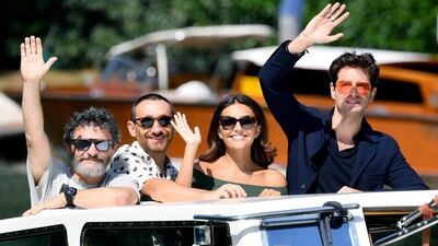 From left; Italian directors Manetti Bros., Marco and Antonio, actress Serena Rossi and Italian actor Giampaolo Morelli arrive at the Venico Lido. Ettore Ferrari / ANSA via AP