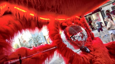 Melihcan Vuraler's bike is red and fluffy with a disco ball at the back. Shahzad Sheikh for The National