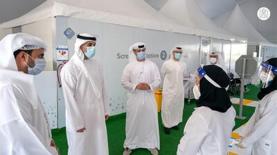 Sheikh Khalid bin Mohamed bin Zayed visits a drive-through testing centre in Abu Dhabi's Corniche. Courtesy: Abu Dhabi Media Office