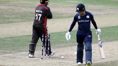 Tom Sole of Scotland after being bowled by the UAE's Rohan Mustafa. Chris Whiteoak / The National