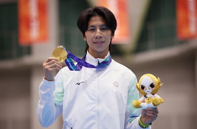 Taiwan's Lin Yu-ting celebrates on the podium after winning the women's 60kg final. Reuters