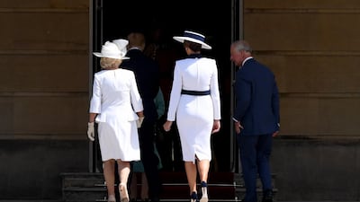 US First Lady Melania (C) with Britain's Prince Charles The Prince of Wales (R) and Camilla the Duchess of Cornwall (L) during the Ceremonial Welcome at Buckingham Palace, in London. EPA