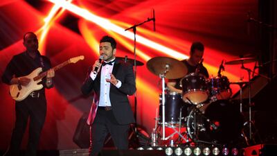 Egyptian pop sensation Tamer Hosny performs on stage in the western Saudi city of Jeddah. Amer Hilabi / AFP