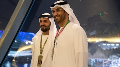 Dr Sultan Al Jaber, UAE Minister of State, Chairman of Masdar and CEO of Adnoc Group (R) and Sheikh Mohammed bin Hamad bin Tahnoon (L), attend the final day of the 2017 Formula 1 Etihad Airways Abu Dhabi Grand Prix. Mohamed Al Hammadi / Crown Prince Court - Abu Dhabi