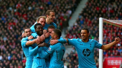 Emmanuel Adebayor, second from the left, and his teammates gave Tim Sherwood plenty to celebrate as Tottenham Hotspur complete a fightback to give Sherwood his first win as interim coach with 3-2 victory over host Southampton. Paul Gilham / Getty Images