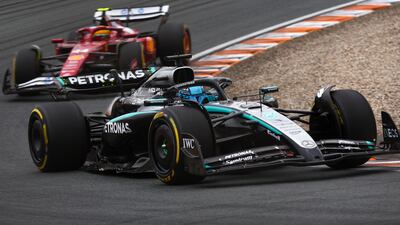 Mercedes driver George Russell, ahead of Ferrari's Lewis Hamilton, on his way to a fourth-place finish. Getty Images