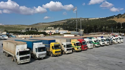 Lorries loaded with UN humanitarian aid at Bab Al Hawa border crossing with Turkey, in Syria's Idlib province, on February 10. AP