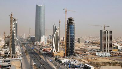 Saudi Arabia’s growth is forecast to grow at just 0.4 per cent this year, compared with a forecast last October of 2 per cent. Above, construction activity in Riyadh. Faisal Al Nasser / Reuters