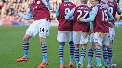 Matthew Lowton of Aston Villa celebrates scoring his team's second goal in a 3-1 win against Stoke City. Chris Brunskill / Getty Images