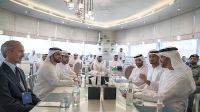 Sheikh Mohammed bin Zayed, right, speaks with James Morse, President of the Rabdan Academy. Mohamed Al Hammadi / Crown Prince Court - Abu Dhabi