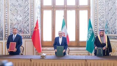 From left, Chinese Deputy Foreign Minister Miao Deyu, Iranian Deputy Foreign Minister Majid Takht-Ravanchi and Saudi Deputy Foreign Minister Waleed Al Khereiji at the meeting in Tehran. Photo: PressTV