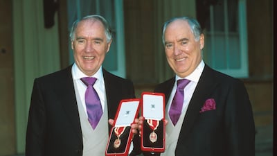 Sir Frederick Barclay (left) and Sir David Barclay outside Buckingham Palace after receiving their Knighthoods. The twins started their careers in the accounts department of General Electric. Getty Images