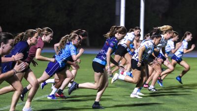 Dubai Sharks players, led by Christelene Steinhobel, take part in training.