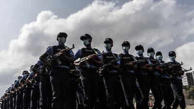 Ethiopian police officers march as a ceremony is held to show the new uniforms and logo in Addis Ababa, Ethiopia. AFP