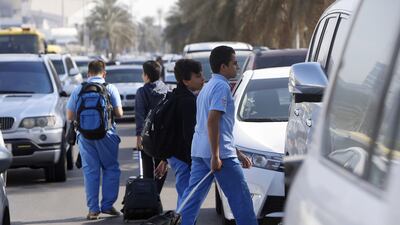 Schools reopened on Sunday after a three-week holiday. Parents have been told not to park carelessly near gates. Ravindranath K / The National