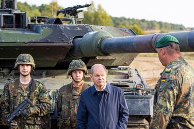 Germany's far right has questioned Chancellor Olaf Scholz's military support to Ukraine. AP