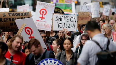 Hundreds of people rallied in front of Trump Tower. Seth Wenig / AP Photo