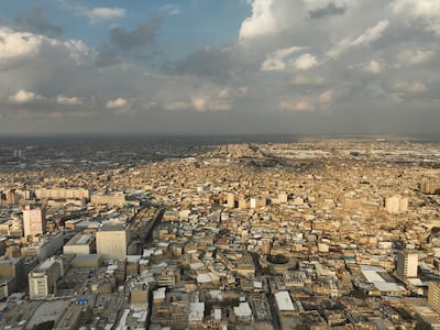 Homes along the Tigris River in Baghdad. Iraq needs about 216,000 new homes each year to accommodate its growing population. AFP