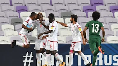 Ahmed Khalil, second left, scored the winning goal for the UAE against Saudi Arabia on Tuesday to keep alive their 2018 World Cup hopes. Giuseppe Cacace / AFP
