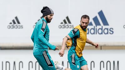Benzema and Dani Carvajal during Real Madrid's training session. Getty